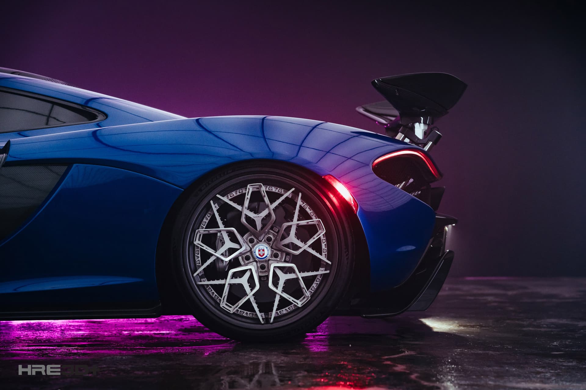 Close-up of a performance car's alloy wheel and tyre